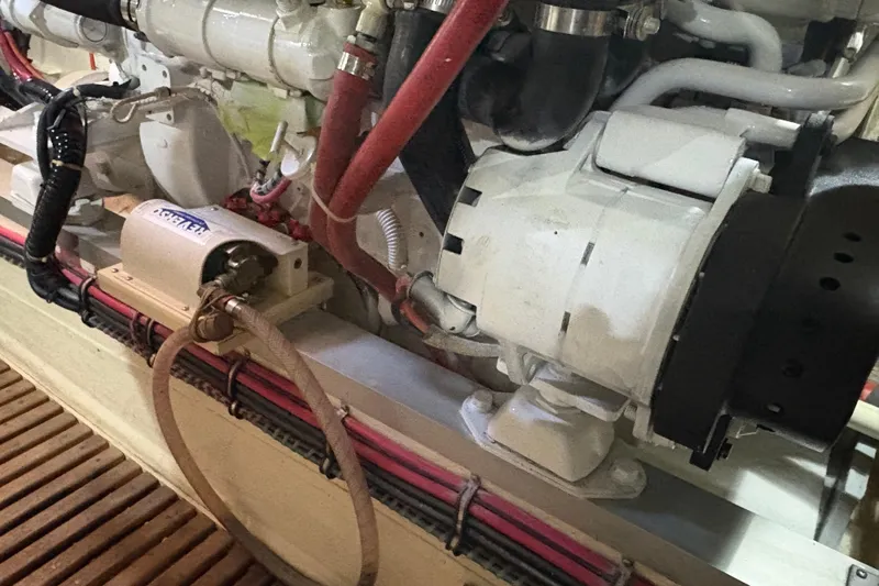 Revere Yacht Photos Pics Engine room of 2002 Grand Banks 42 Classic yacht, showcasing mechanical components and wiring.