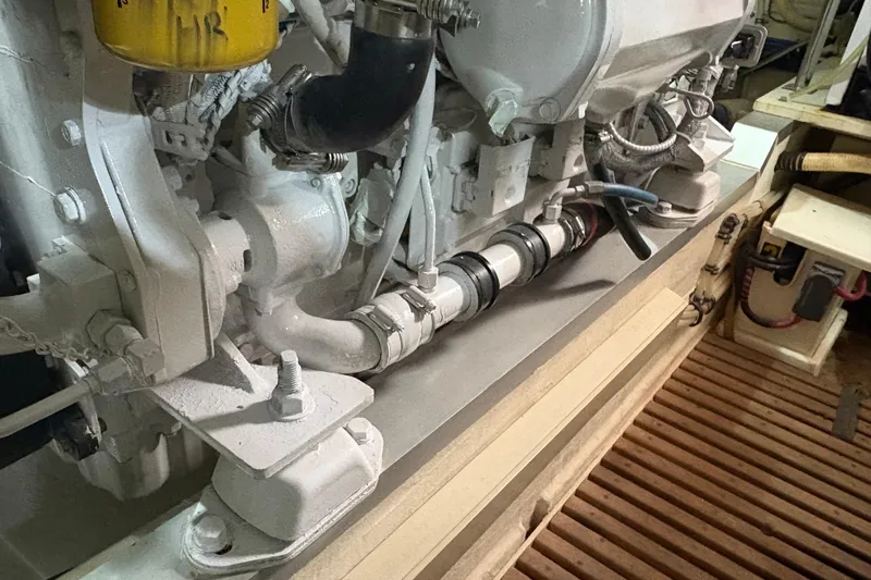 Revere Yacht Photos Pics Engine compartment of a 2002 Grand Banks 42 Classic yacht, showcasing mechanical components.