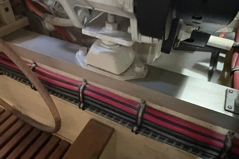 Revere Yacht Photos Pics Engine compartment of a 2002 Grand Banks 42 Classic, showcasing wiring and mechanical components.