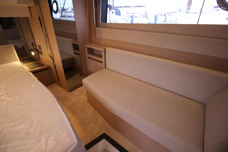  Yacht Photos Pics Luxurious interior of 2025 Prestige 520 yacht with elegant seating and modern design.