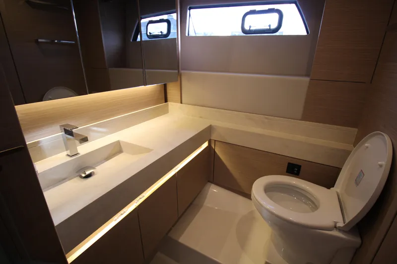  Yacht Photos Pics Luxurious bathroom in 2025 Prestige 520 yacht with modern fixtures and elegant design.