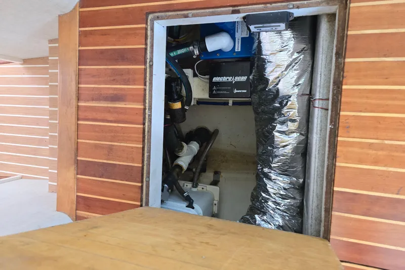 Lady Elizabeth Yacht Photos Pics Engine compartment of 2006 Huckins Atlantic 44 yacht, featuring mechanical components and ductwork.