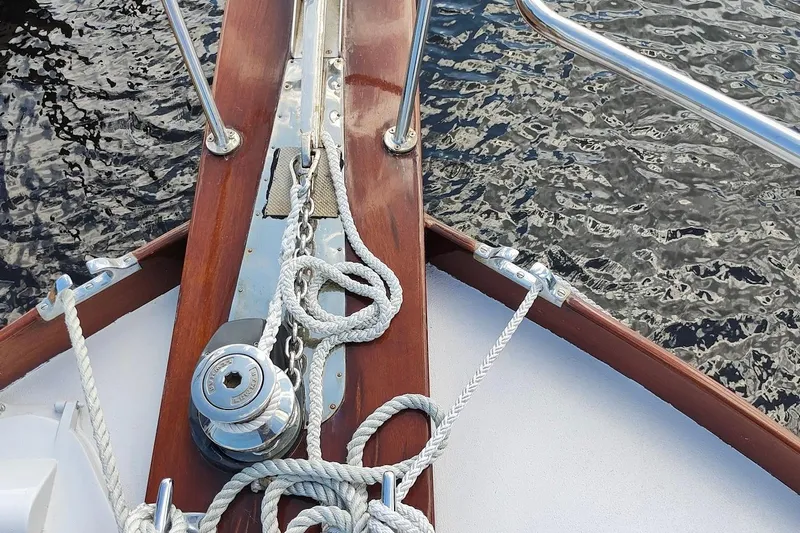 Lady Elizabeth Yacht Photos Pics Bow of 2006 Huckins Atlantic 44 yacht with ropes and winch on deck.