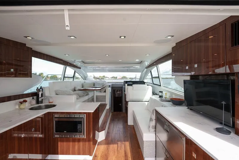  Yacht Photos Pics Luxurious interior of 2023 Cruisers Yachts 46 Cantius with modern amenities and elegant design.