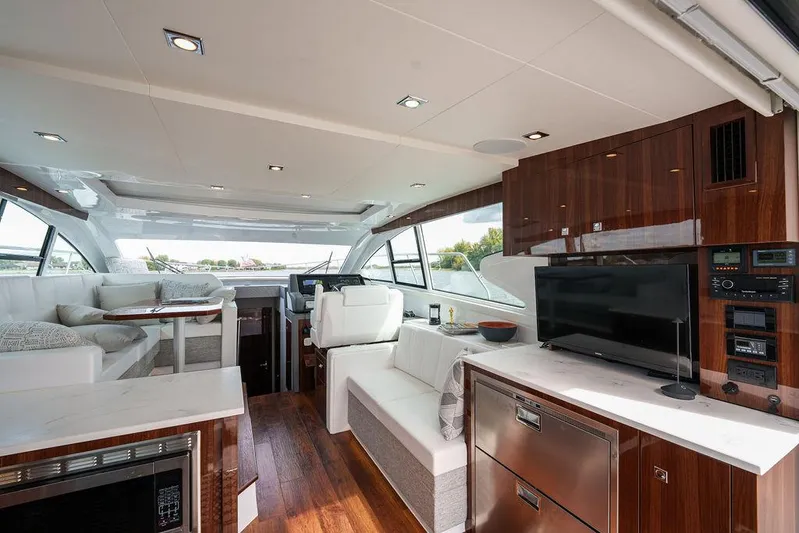  Yacht Photos Pics Luxurious interior of 2023 Cruisers Yachts 46 Cantius with modern amenities and elegant design.