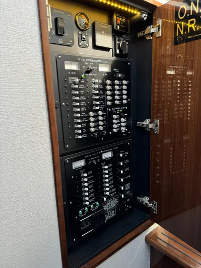  Yacht Photos Pics Electrical panel inside 2023 Cruisers Yachts 46 Cantius, showcasing switches and controls.
