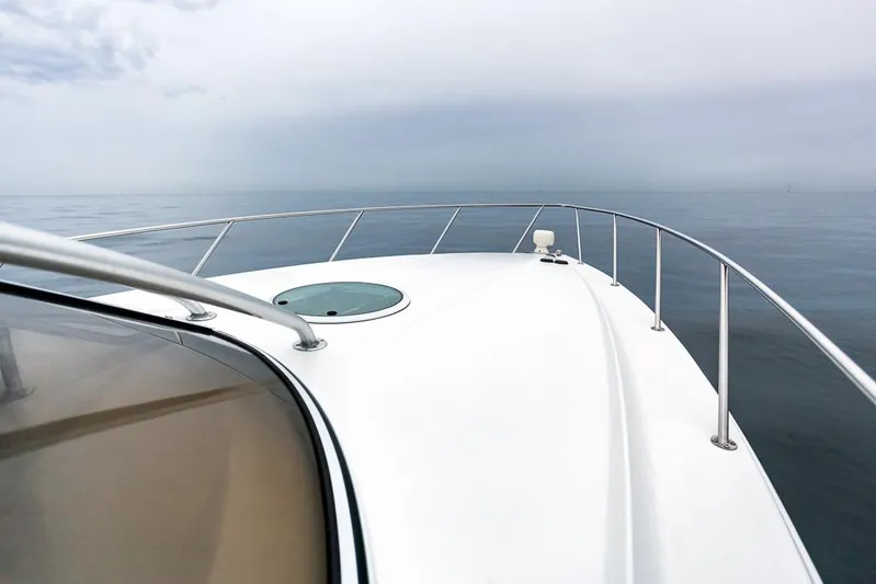 Pressin Paws Yacht Photos Pics 2008 Fountain - Bow