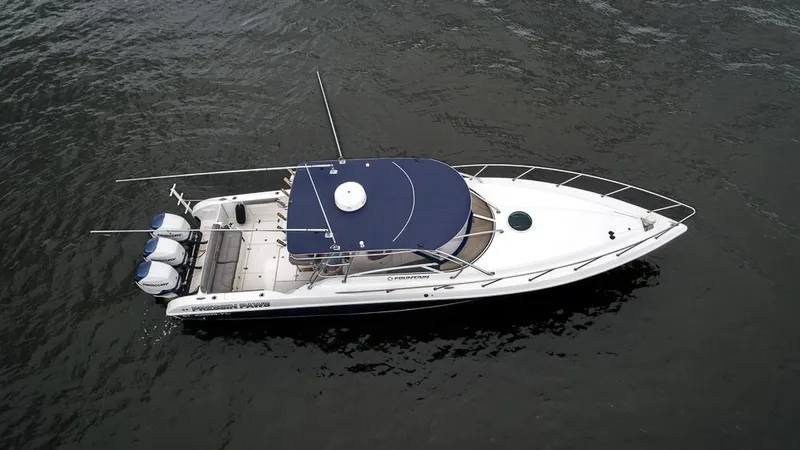 Pressin Paws Yacht Photos Pics 2008 Fountain - Exterior profile on the water