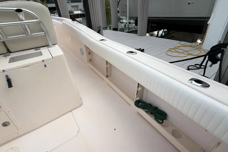  Yacht Photos Pics 2010 Grady-White Canyon 336 boat interior with seating and storage compartments.