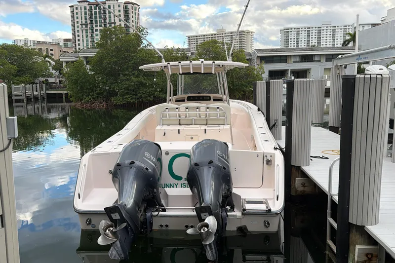  Yacht Photos Pics 2010 Grady-White Canyon 336 boat docked with twin Yamaha engines.