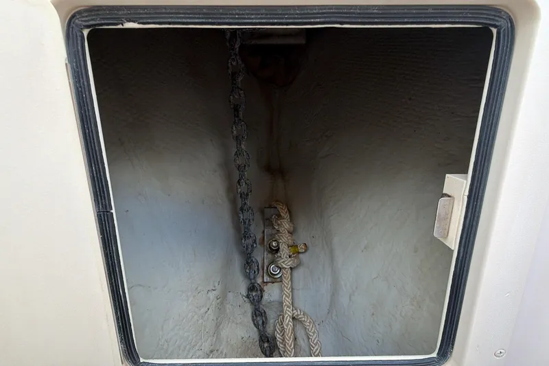  Yacht Photos Pics Anchor chain and rope storage compartment on 2010 Grady-White Canyon 336 boat.