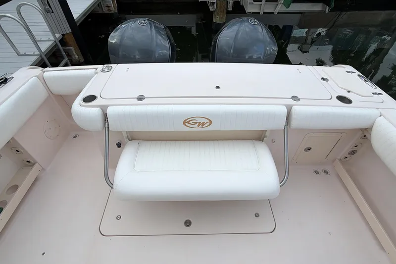  Yacht Photos Pics 2010 Grady-White Canyon 336 boat interior with seating and dual outboard motors.