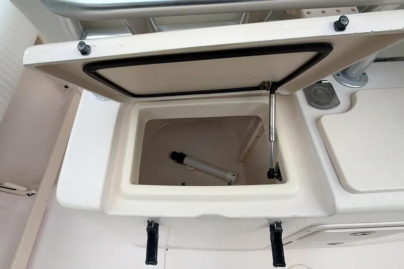  Yacht Photos Pics Open storage compartment on a 2010 Grady-White Canyon 336 boat.