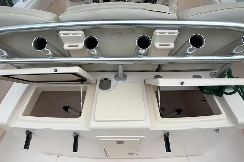 Yacht Photos Pics 2010 Grady-White Canyon 336 boat interior with rod holders and storage compartments.