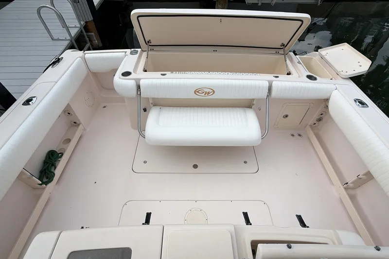  Yacht Photos Pics 2010 Grady-White Canyon 336 boat interior with seating and storage compartments.