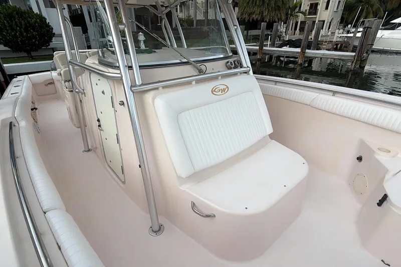  Yacht Photos Pics 2010 Grady-White Canyon 336 boat interior with seating and stainless steel railings.