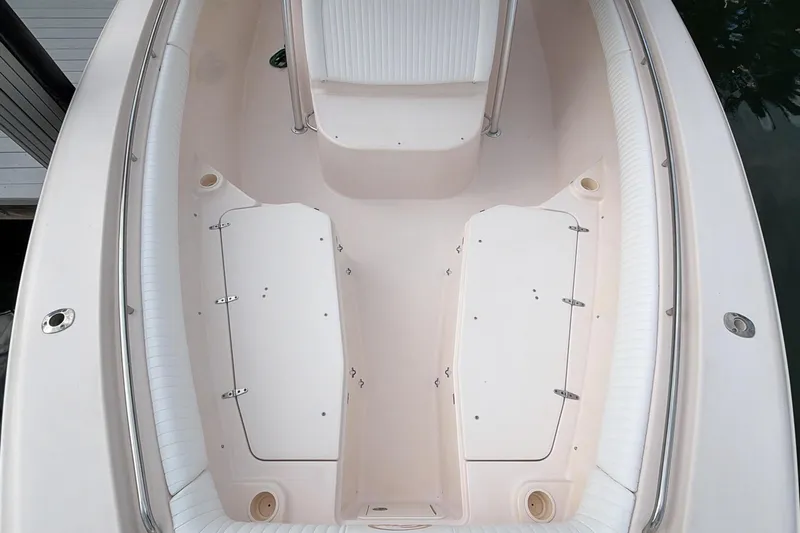  Yacht Photos Pics 2010 Grady-White Canyon 336 boat interior with seating and storage compartments.