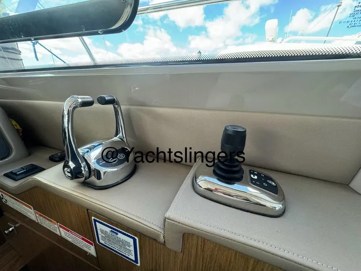  Yacht Photos Pics 2017 Sea Ray Sundancer helm controls with joystick and throttle, interior view.