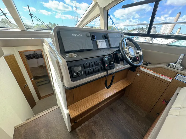  Yacht Photos Pics 2017 Sea Ray Sundancer helm with modern controls and navigation equipment.
