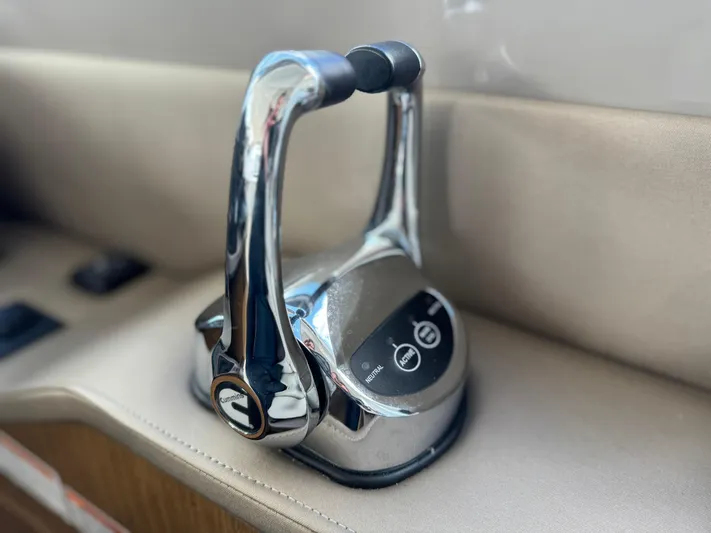  Yacht Photos Pics Chrome throttle control on 2017 Sea Ray Sundancer yacht dashboard.