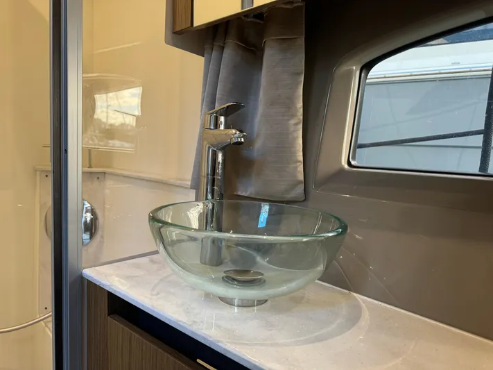 Yacht Photos Pics Modern glass sink in 2017 Sea Ray Sundancer yacht bathroom.