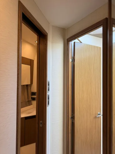  Yacht Photos Pics Interior view of 2017 Sea Ray Sundancer yacht, featuring wooden doors and modern design.