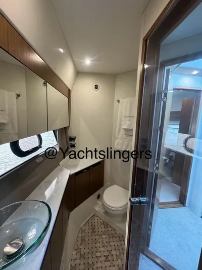  Yacht Photos Pics Luxurious bathroom in 2017 Sea Ray Sundancer yacht with modern fixtures and elegant design.