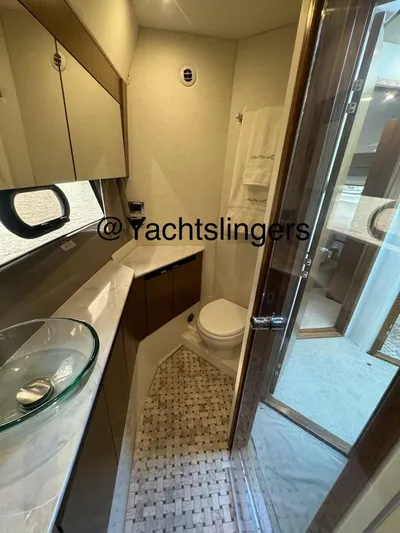  Yacht Photos Pics Luxurious bathroom in 2017 Sea Ray Sundancer yacht with modern fixtures and elegant design.