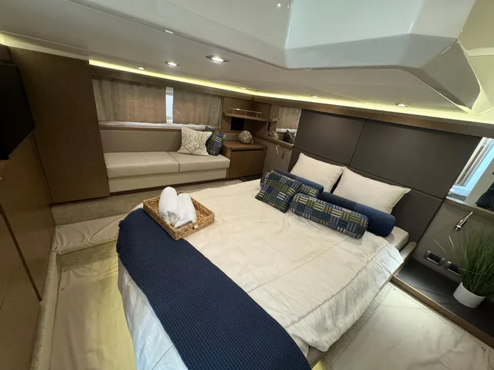  Yacht Photos Pics Luxurious 2017 Sea Ray Sundancer cabin interior with cozy bed and elegant decor.
