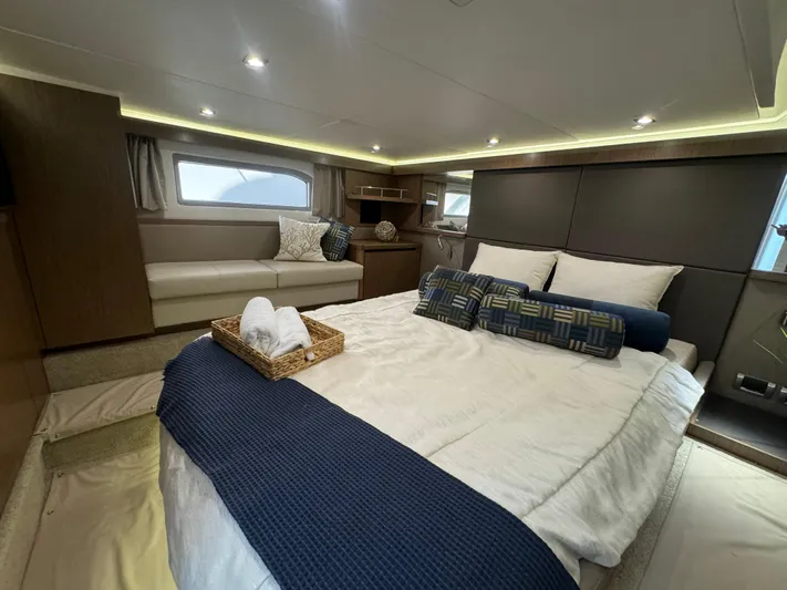  Yacht Photos Pics Luxurious 2017 Sea Ray Sundancer cabin interior with cozy bed and elegant decor.