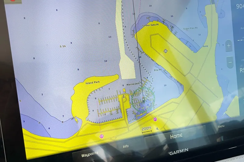 Y Knot Yacht Photos Pics Garmin navigation screen on a 2021 Regal 36 Grande Coupe, displaying a detailed marine map.