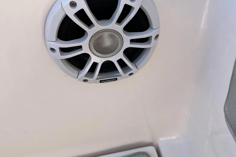 Y Knot Yacht Photos Pics Speaker on 2021 Regal 36 Grande Coupe boat interior.