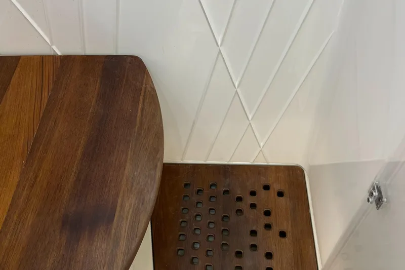 Y Knot Yacht Photos Pics Wooden interior detail of 2021 Regal 36 Grande Coupe boat.