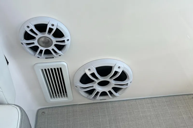 Y Knot Yacht Photos Pics 2021 Regal 36 Grande Coupe speakers and vent on boat interior wall.