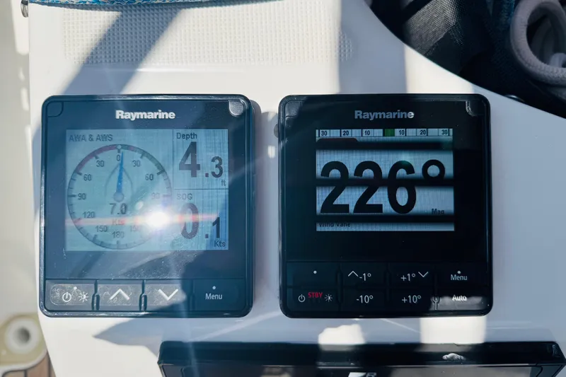 Pearl Yacht Photos Pics Raymarine navigation displays on 2023 Jeanneau 380 sailboat, showing depth and heading.