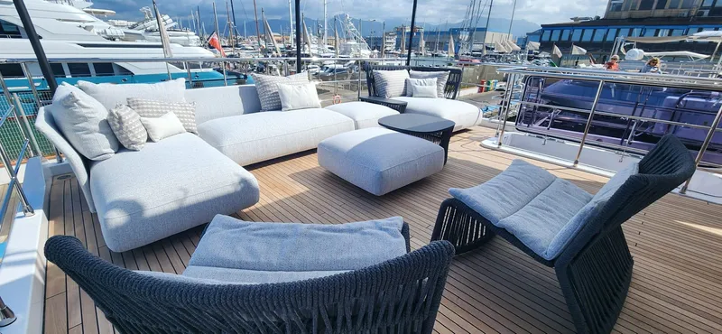 Sunlife Yacht Photos Pics Luxurious deck seating on 2024 Azimut Grande 27 METRI yacht, docked at marina.