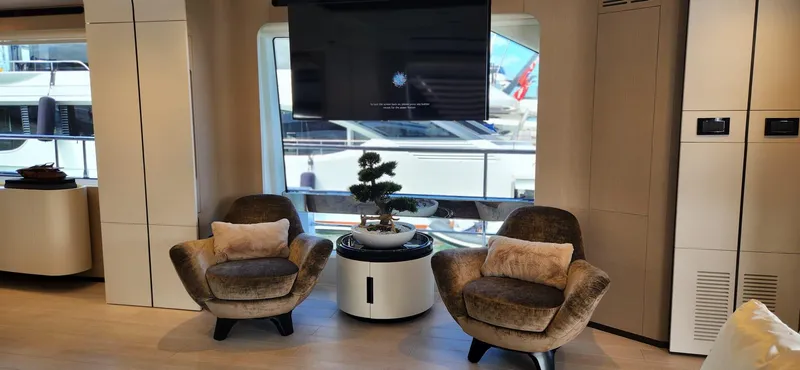 Sunlife Yacht Photos Pics Luxurious interior of 2024 Azimut Grande 27 METRI yacht with plush seating and elegant decor.