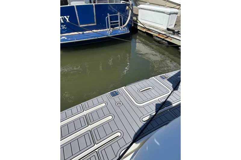 Miss Louise II Yacht Photos Pics Docked boats with a view of the water, featuring a 2007 Meridian 411SB.