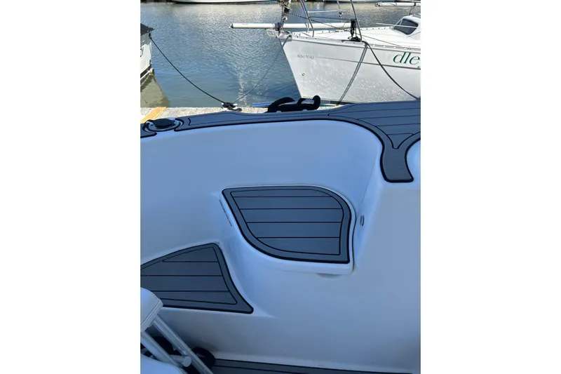 Miss Louise II Yacht Photos Pics 2007 Meridian 411SB boat deck with sleek design and water view.