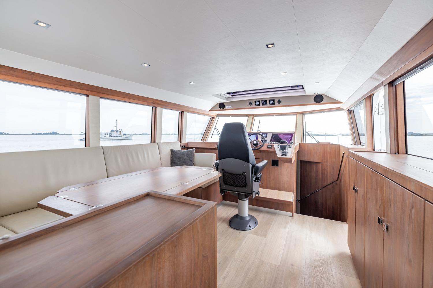 Interior of 2016 Explorer NG 50 Alu Fast Going yacht with modern helm and seating.