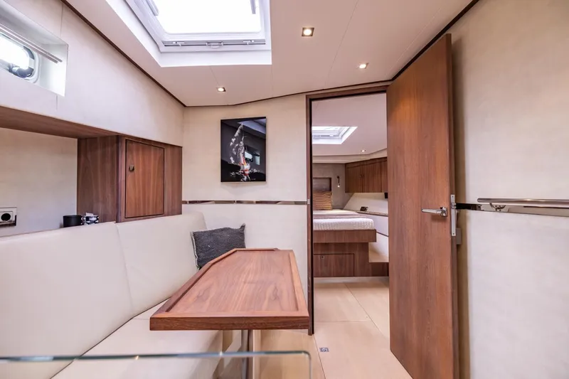 Wild Thing Yacht Photos Pics Luxurious interior of 2016 Explorer NG 50 Alu Fast Going yacht with modern furnishings.