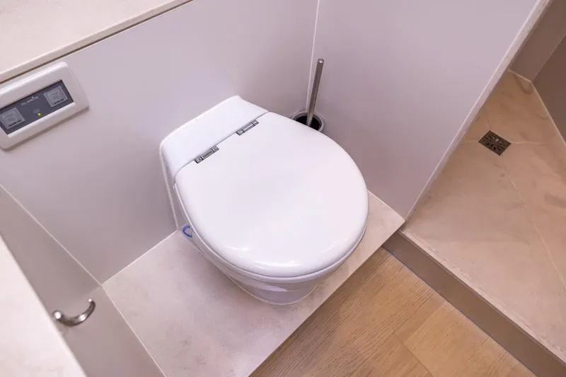 Wild Thing Yacht Photos Pics Modern yacht bathroom with sleek toilet design, Explorer NG 50 Alu Fast Going, 2016 model.