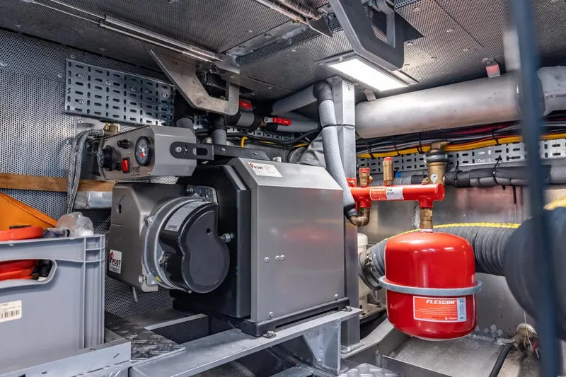 Wild Thing Yacht Photos Pics Engine room of 2016 Explorer NG 50 Alu Fast Going vessel, featuring mechanical components.