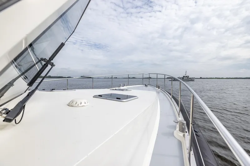 Wild Thing Yacht Photos Pics 2016 Explorer NG 50 Alu Fast Going yacht on open water under cloudy sky.