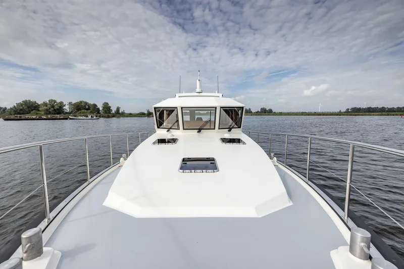Wild Thing Yacht Photos Pics 2016 Explorer NG 50 Alu Fast Going yacht on calm water under cloudy sky.