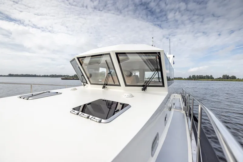 Wild Thing Yacht Photos Pics 2016 Explorer NG 50 Alu Fast Going yacht on calm water under cloudy sky.