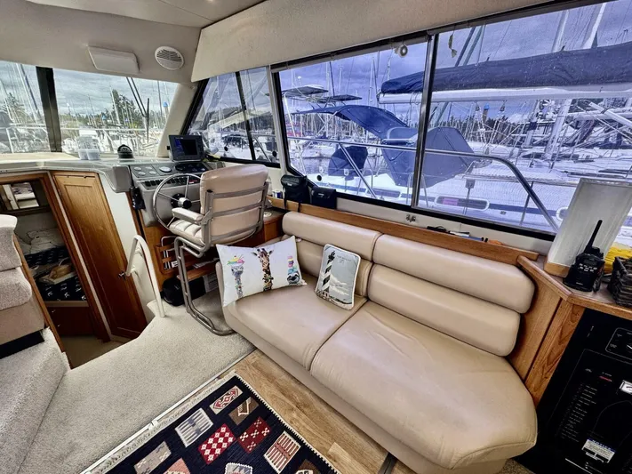  Yacht Photos Pics Interior of 1998 Bayliner 4087 Aft Cabin Motoryacht with beige seating and helm station.