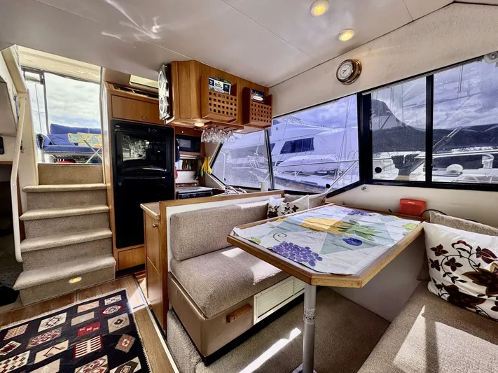  Yacht Photos Pics Interior of 1998 Bayliner 4087 Aft Cabin Motoryacht with dining area and kitchen.