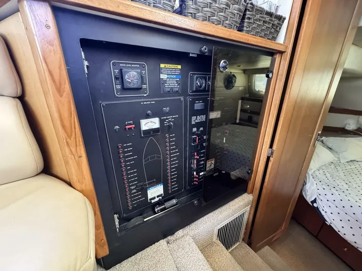  Yacht Photos Pics 1998 Bayliner 4087 Aft Cabin Motoryacht electrical panel in cabin interior.
