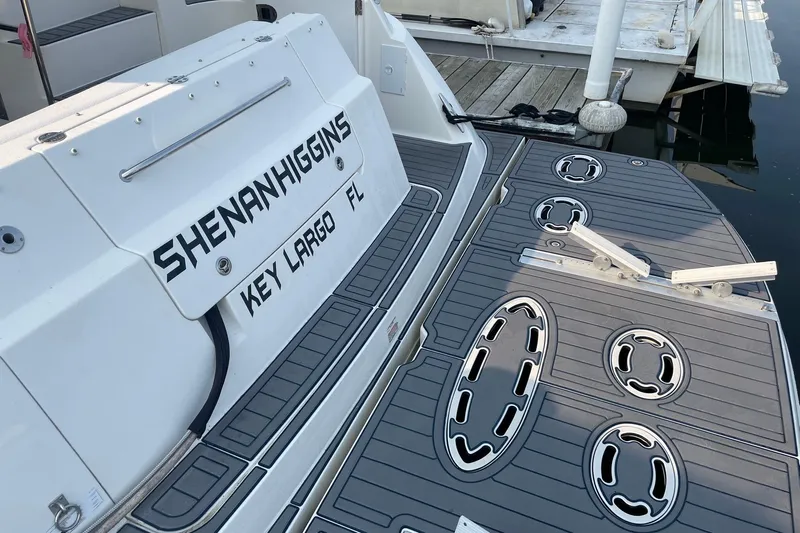 Shenanhiggins Yacht Photos Pics 2008 Sea Ray 47 Sedan Bridge boat docked in Key Largo, Florida.